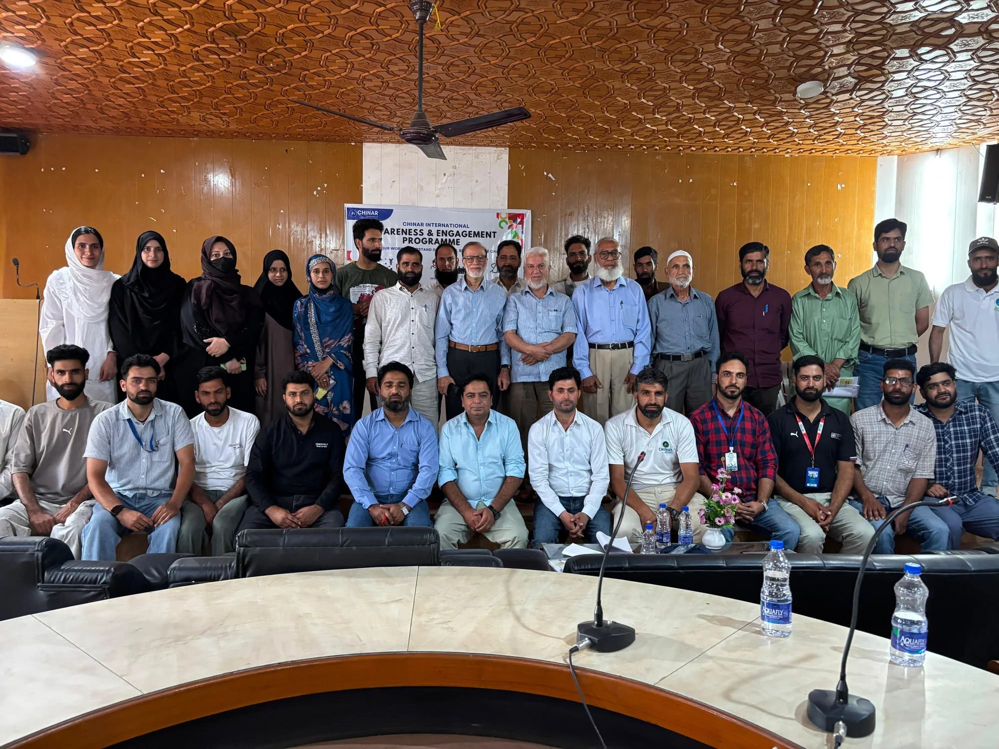 Participants and facilitators gathered after a community awareness and engagement programme