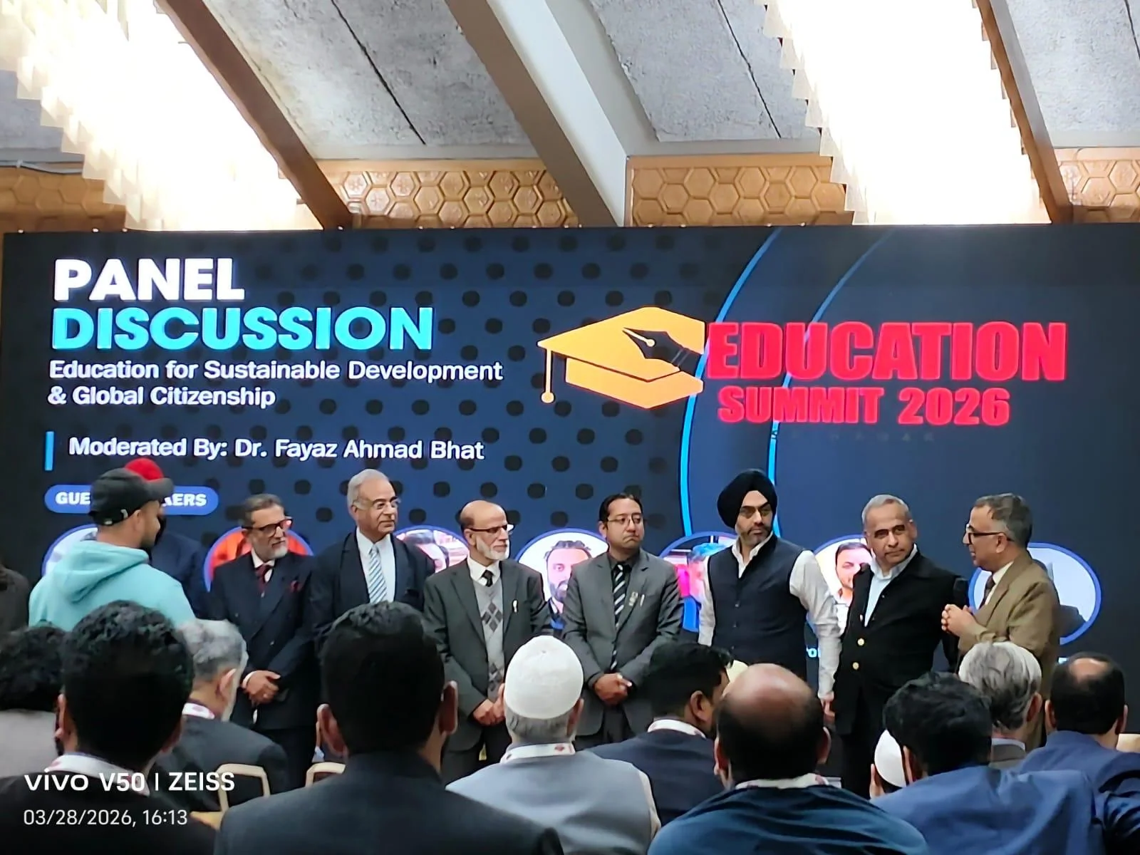 Speakers gathered during an education summit panel discussion